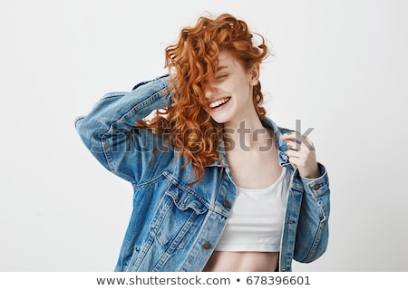 Foto stock: Beautiful Young Red Haired Woman With Freckles