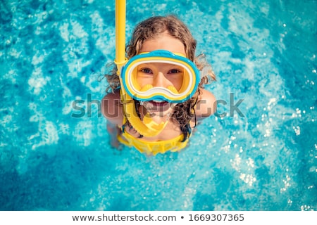 ストックフォト: Girl With Diving Goggles In Sea Having Summer Vacation
