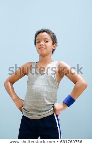 Foto d'archivio: Boy Perspiring Wearing Sports Clothing