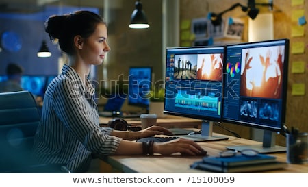 Stock fotó: Editor Editing Video On Computer