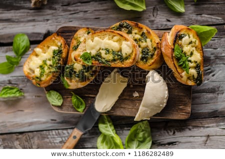 Foto stock: Garlic Herbs Toast With Fresh Mozzarella