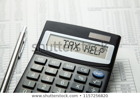 Stock photo: A Calculator With The Word Taxes On The Display