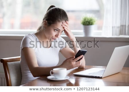 Imagine de stoc: Upset Woman Repairing Computer
