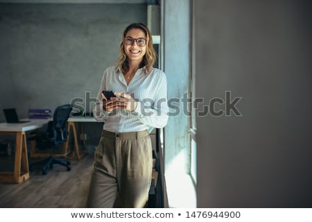 [[stock_photo]]: Young Casual Relaxed Business Woman