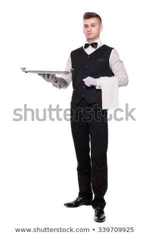 Foto stock: Smiling Waiter Holding Out Empty Silver Tray