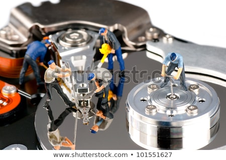 Stockfoto: Team Of Technicians Repair Hard Disk