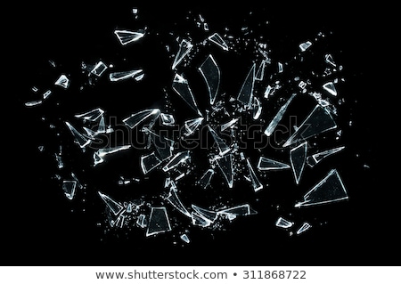 Foto d'archivio: Shattered Glass Sharp Pieces On Black