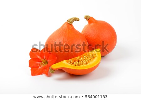 Stockfoto: Orange Pumpkins And Hibiscus Flower