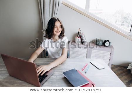 Stock photo: Teenage Girl Doing Homework