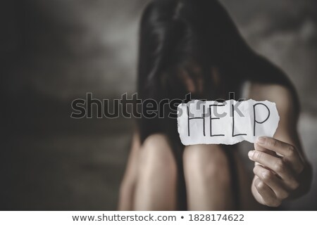 Foto stock: Woman And The Text Stop Violence In A Paper