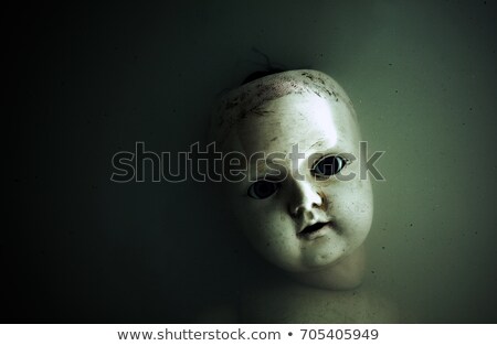 Foto stock: Creepy Dolls In Dark Dirty Water