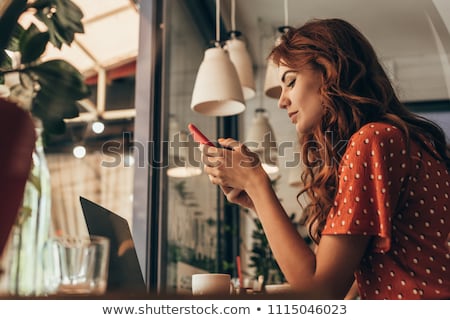 Сток-фото: Young Women With Smartphones And Coffee At Cafe