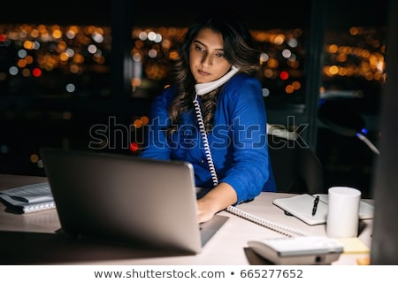 [[stock_photo]]: Businesswomen With Computer Working Late At Office