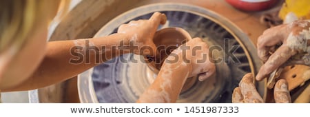 Zdjęcia stock: Father And Son Doing Ceramic Pot In Pottery Workshop