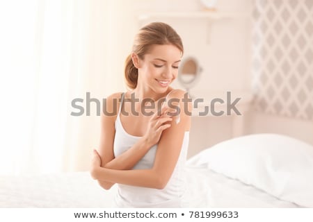 Stock fotó: Beautiful Woman Applying Body Cream