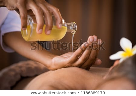 Foto stock: Woman Enjoying A Ayurveda Oil Massage