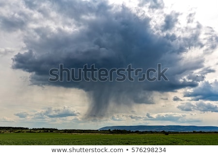 Stockfoto: Big Powerful Storm Clouds At Summer