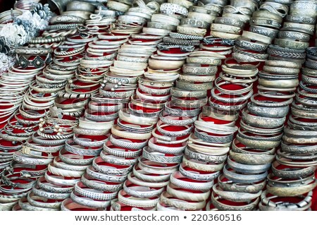 [[stock_photo]]: Cheap Souvenir Bangles At Asian Market Laos