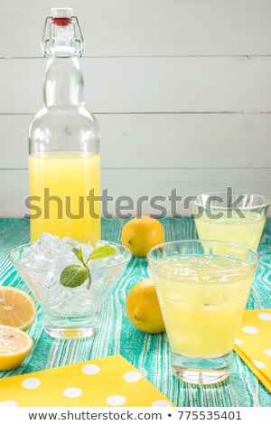 Stockfoto: Glasses With Ice Cubes On Wooden Table