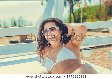 Stock fotó: Girl With Afro Haircut Relaxing In Swimming Pool