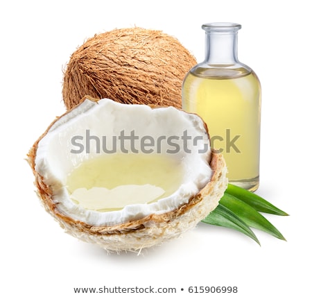 Foto stock: Coconut Oil Tropical Leaves And Fresh Coconuts