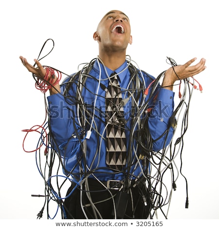 Om înfășurat în cabluri Imagine de stoc © iofoto
