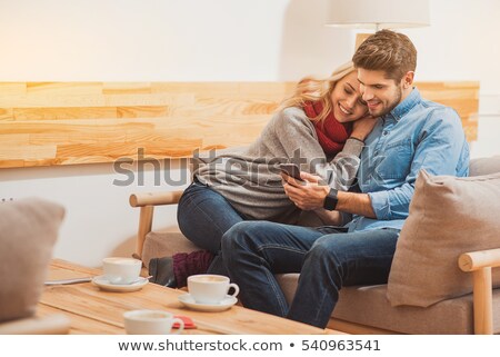 [[stock_photo]]: Young Couple In Cafe