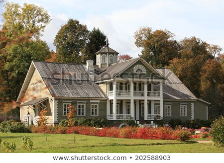 Stock fotó: Rural House And Flowerbed