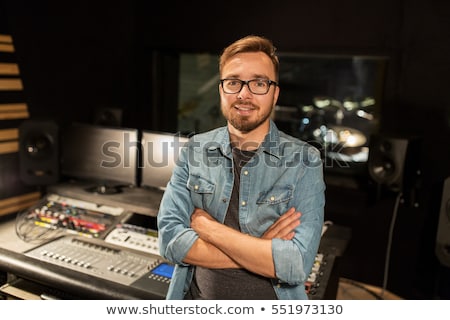 Stockfoto: Audio Engineer Mixing Board