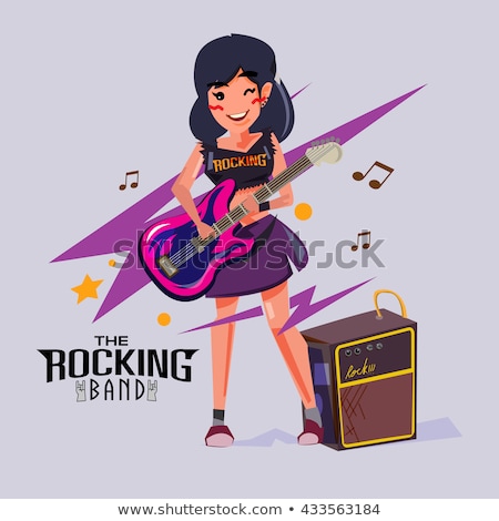 Stock photo: Female Guitarist Playing In Her Band