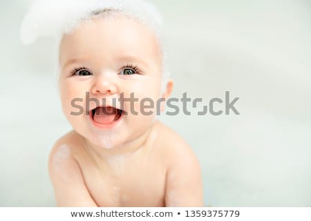 ストックフォト: Cute Baby Boy Playing With Soap Bubbles