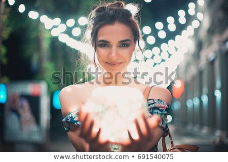 Stock photo: Portrait Of Beautiful Girl With Bokeh At Background