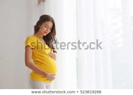 Stock photo: Pregnant Woman Abdomen