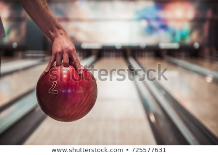 Foto stock: Man Holding A Bowling Ball