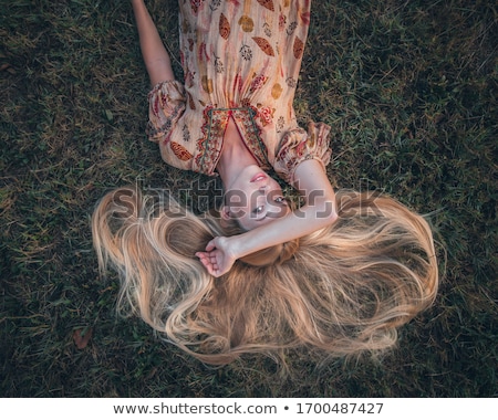 Stock photo: Beautiful Young Woman Posing With Hands On Waist