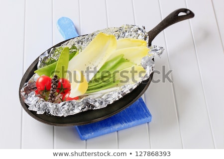 Foto d'archivio: Fresh Vegetables On Tinfoil In Skillet