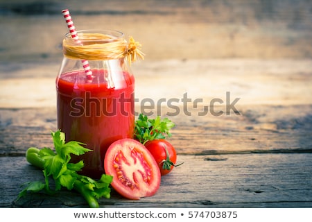 Stock photo: Glass Of Tomato Juice And Fresh Tomatoes