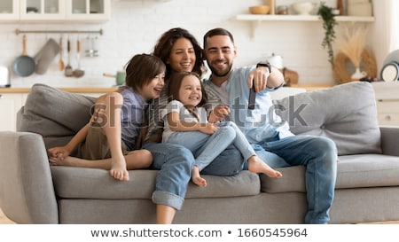 Stockfoto: Women On The Couch Taking Self Portrait