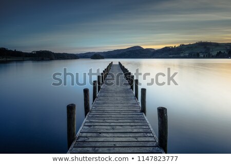 Stock photo: A Long Dock Over A Water