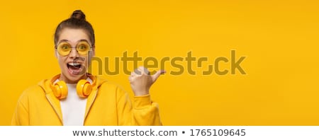 Stock photo: Portrait Of An Excited Girl Wearing Hoodie