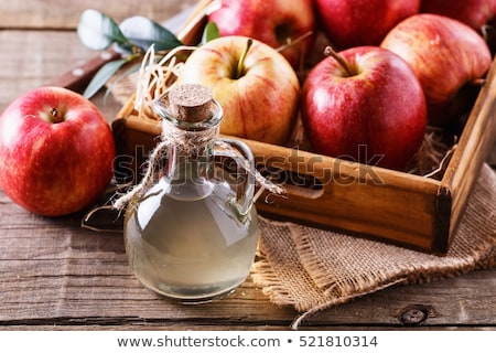 Foto stock: Bottle And Glass Of Homemade Organic Apple Cider With Fresh Apples In Box On Wooden Background