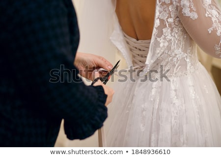 Foto d'archivio: Working On Wedding Dress Corset