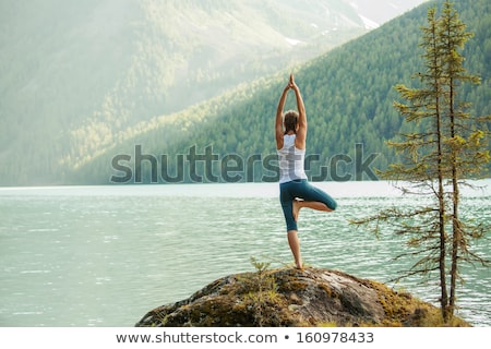 Foto d'archivio: Woman Yoga In Nature