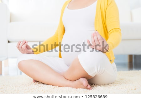 Foto d'archivio: Asian Pregnant Woman Meditating