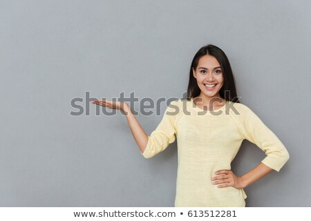 Stock photo: Woman Holding Nothing