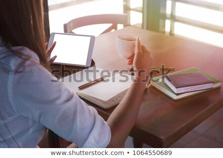 Сток-фото: Digital Tablet And Diary With Cup Of Tea