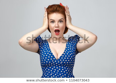 Foto d'archivio: An Excited Young Woman Shouting Holding A Retro Camera In Hand