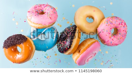 Foto stock: Stack Of Colorful Donuts