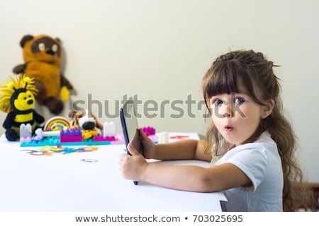 Stock photo: Young Girl With Tablet Pc