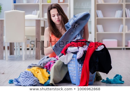 Tired Woman Doing Laundry Imagine de stoc © Elnur